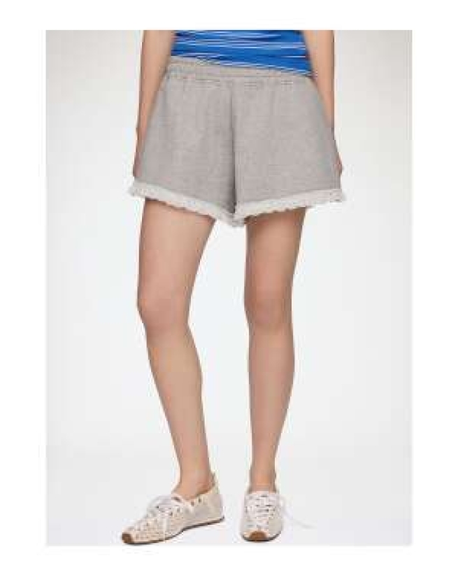 Ganni - Sweat shorts med blonder